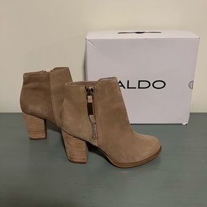 Aldo booties with gold zipper detail. Size 7